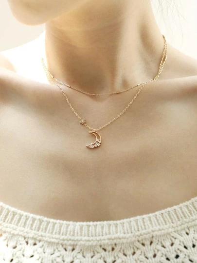 Nooxian Set de 2 collares elegantes y versátiles con elementos de estrella y luna con microincrustraciones de circonita en color dorado