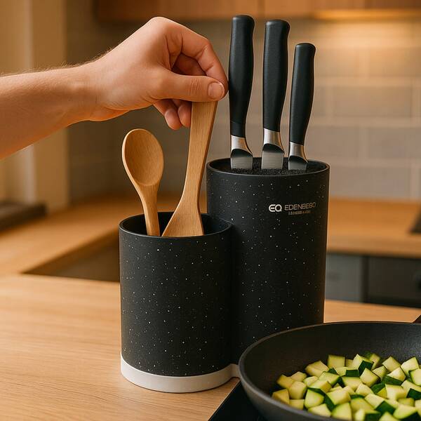 A Modern, Sturdy Gray Knife Block For Storing Various Knives. Utilizing Universal Brush Insert Technology, It Accommodates Knives Of Different Sizes And Shapes. The Exterior Features A Gray Speckled Texture. A Versatile Knife Block And Kitchen Utensil Organizer, It's Perfect For Ceramic Knives, Steak Knives, And More. Knives Not Included.