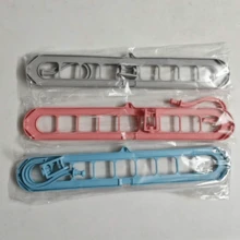 9孔可折叠塑料衣架，晾衣架，便携式收纳架，多功能衣柜收纳架，衣架，衣柜挂架，服装收纳整理架，适用于衣柜整理、家庭、宿舍、旅行等场合。 - 彩色 - 查看 7