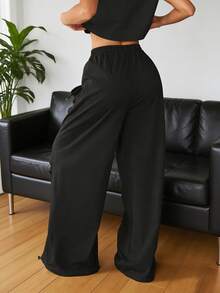 Quần nữ cạp chun co giãn, kiểu dáng rộng rãi, có túi, thích hợp cho tập gym, hoạt động ngoài trời, khiêu vũ, đi làm, mặc được cả bốn mùa xuân. - màu đen - Xem 2