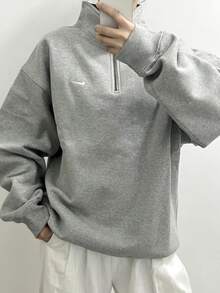 Suéter Nike Solo Swoosh de manga larga con media cremallera y logotipo bordado en color liso para hombre - Gris Oscuro - Ver 8