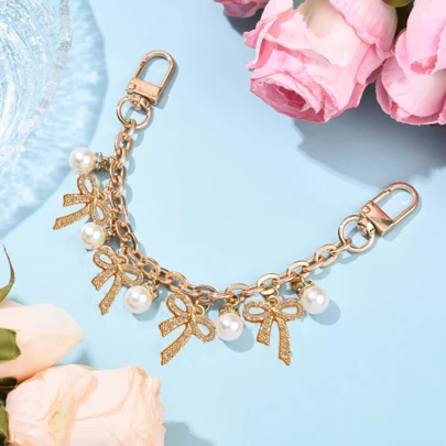 时尚仿珍珠蝴蝶结装饰金色链条吊坠包包配件 DIY 首饰配件，适用于手提包单肩包装饰