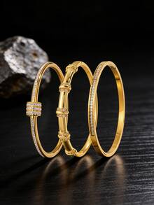 3/1件 - 多功能三件套手链，结合不锈钢和铜，展现低调奢华，锆石细节为基本设计增添光彩。 - 金色 - 查看 13