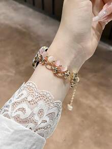 1条女士金色猫眼石手链金属表带,兼容38/40/41/42/44/45/46/49mm表带,适用于Ultra/SE/10/9/8/7/6/5/4/3/2/1等型号手表。 - 金粉貓眼 - 查看 3