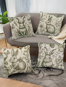 Bộ 4 vỏ gối in hình, gối tựa in hình thỏ cho ghế sofa phòng khách, kết hợp với cây xanh xung quanh để tạo không gian ấm cúng và tự nhiên. Sản phẩm cũng có sẵn dạng gối cùng kiểu dáng đựng trong giỏ, thích hợp cho trang trí nhà cửa, kích thước 17.7x17.7 inch. - màu xanh lá - Xem 1