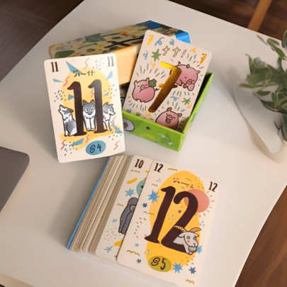 A Set Of Animal-Themed Board Game Cards For 2-5 Players. It's A Casual Gathering Game Suitable For Leisure Time. It Involves Memory Matching And Interactive Fun. It's A Tabletop Game That Helps Ease The Atmosphere Among Family And Friends.