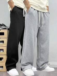 这款男士休闲运动裤采用宽松直筒版型，内衬保暖面料，穿着舒适垂坠。适合室内外穿着，也是送给情侣的绝佳礼物。裤子采用 100% 涤纶面料，配有抽绳腰带，可调节松紧，并有多种颜色可选。 - 淺灰色 - 查看 7