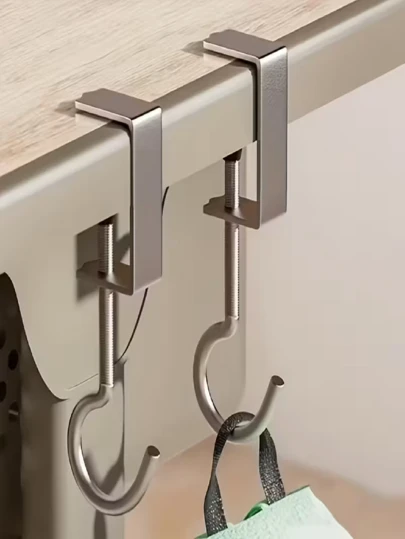 1个免钻孔可移动挂钩，采用ABS高强度材料制成，适用于悬挂各种物品，可用于学生书桌、办公桌、宿舍、厨房、浴室等场所。