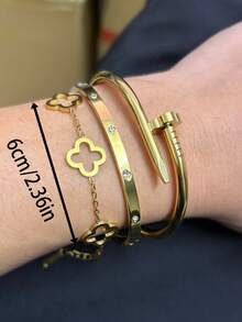 مجموعة سوار من الفولاذ المقاوم للصدأ بطلاء ذهبي عيار 18 قيراط مزين بأظافر وبرسم رباعي الأوراق، مناسب للارتداء اليومي للنساء في الصيف، هدية عيد الميلاد، هدية العطلات، لا يسهل بهتانه، مناسب للارتداء اليومي للنساء، هدية عيد الميلاد، هدية العطلات، هدية عيد الحب، هدية عيد الأم - الذهبي - مشاهدة 5