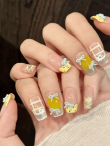 10片方形手工美甲贴纸，适合派对和日常佩戴，易于粘贴。10片Y2K风格手工美甲贴纸，“粉黄蝴蝶结”清新甜美，撞色设计，方形美甲，适合女孩和女士在节日、派对和日常佩戴。手工按压式美甲贴纸。 - 黃色 - 查看 4