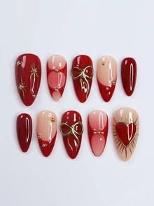 10片纯手工制作美甲贴片，长款杏仁甲，红色系美甲，甜美酷炫奢华风格，裸粉色搭配红色法式晕染，手绘蝴蝶结、爱心、星爆图案，金属钻石点缀，甜美精致，充满活力，适合女性和女孩，春夏秋冬节日情人节派对及日常佩戴。 - 紅色 - 查看 1
