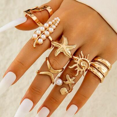 Set de 7 anillos de mujer con diseños de estrella de mar, sol y perla, anillos asimétricos de aleación con diseño de hoja
