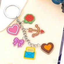 1 móc khóa có nhiều mặt dây chuyền, móc khóa mặt dây chuyền đa dạng phù hợp cho Ngày Valentine/Lễ Phục Sinh/Tháng Lịch sử Người da đen, phụ kiện trang trí túi xách di động, móc chìa khóa xe hơi sử dụng hàng ngày/quà tặng/phụ kiện tiệc tùng - Màu sắc và kiểu dáng ngẫu nhiên - Xem 2