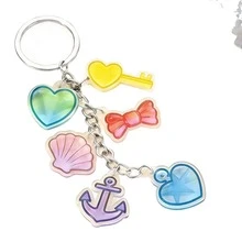 1 móc khóa có nhiều mặt dây chuyền, móc khóa mặt dây chuyền đa dạng phù hợp cho Ngày Valentine/Lễ Phục Sinh/Tháng Lịch sử Người da đen, phụ kiện trang trí túi xách di động, móc chìa khóa xe hơi sử dụng hàng ngày/quà tặng/phụ kiện tiệc tùng - Màu sắc và kiểu dáng ngẫu nhiên - Xem 5