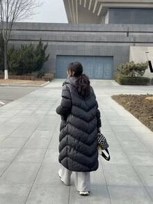 Chaqueta larga y versátil de plumón cómoda para mujer de Nike Sportswear - Negro - Ver 9