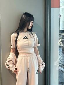 Adidas True Healing 系列運動服飾黑標制服純棉運動休閒落肩短袖T恤女款奇蹟石英色 - 卡其色 - 查看 9