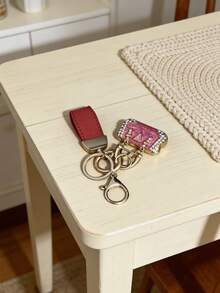 法国珐琅钻石钥匙扣 | 云朵图案浮雕手工吊坠 | 汽车钥匙个性艺术品 | 奢华男女通用闪亮锌合金饰品 - 包包造型鑰匙扣 - 查看 15