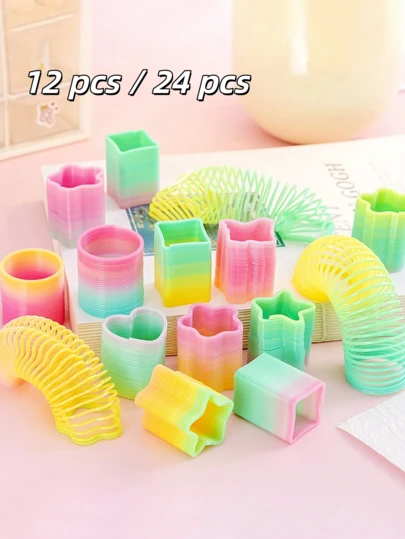 Set de 24 piezas de recuerdos de fiesta arcoíris, juguetes de plástico miniatura de formas y colores aleatorios, juguetes de resorte antiestrés, adecuados como regalos de cumpleaños para hombres y mujeres, premios de carnaval, rellenos para bolsas de regalo, adornos navideños