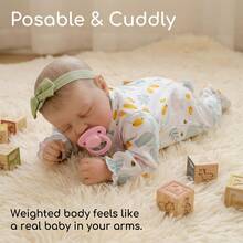 19-Inch Vinyl Mango Print Romper Teddy Handmade Reborn Doll, Fabric Body Realistic Doll, Handmade Implanted Golden Hair, Companion Collectible Toy. (Comes With Random Pacifier, Bottle, Diaper) - Mint Green - View 3