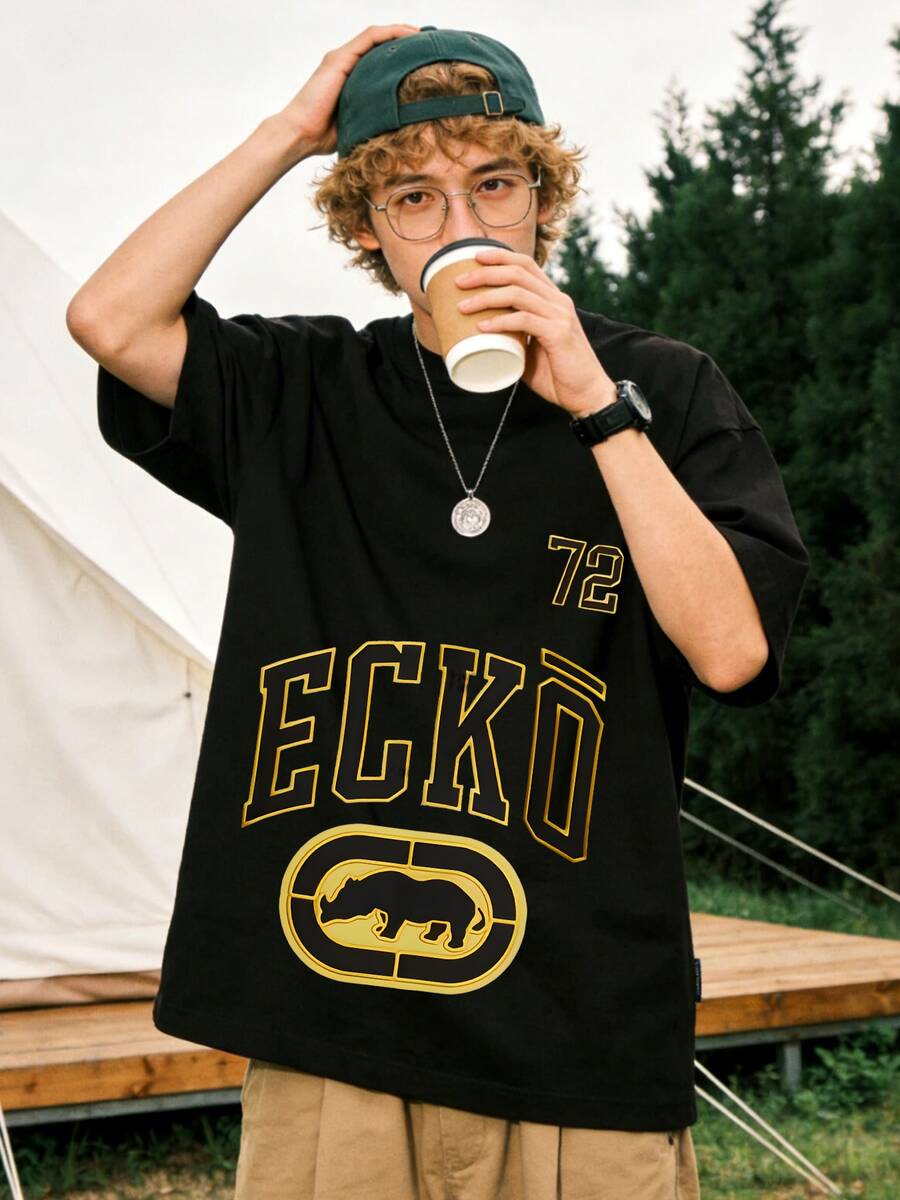 Ecko Unltd 72 Gold Graphic Black T-Shirt, Vintage Sports Style Rhino Logo Urban Street Wear Tee For Men, Vintage Sports Event, Summer Music Festival, Urban Hangout, Casual Daily Wear. - 黑色2 - 查看 1