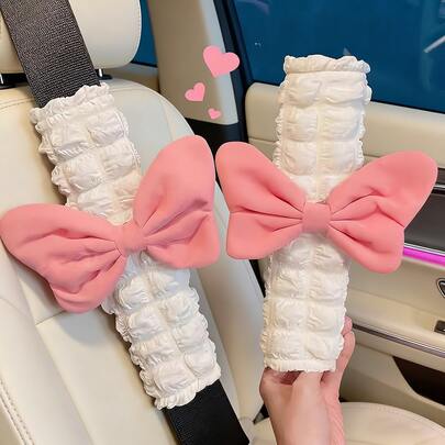 Bộ 2 miếng bọc dây an toàn ô tô có nơ xinh xắn, phù hợp với mọi loại xe, miếng đệm bảo vệ cổ mềm mại, đệm dây an toàn ngắn.