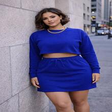 Conjunto Babado é a escolha perfeita para quem ama estar na moda com estilo e conforto. Composto por saia gringa super na moda e cropped manga longa - Azul Royal - Visão 1