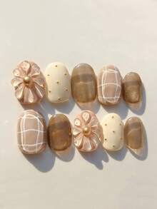 10pcs Handmade Nail Art Stick-On Fake Nails, Removable Acrylic Oval Shaped Nails, Cute Minimalist Designs Including Brown Plaid, Brown Flowers, Coffee Pearl, 3D Carved Patterns, Suitable For New Year, Valentine's Day, Gatherings, Seasons Handmade Press On Nails - Coffee Brown - View 1