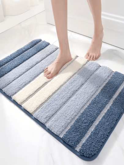 1 tấm thảm phòng tắm "GETNAKED" với kết cấu sợi cao và thấp, họa tiết hoa 3D dập nổi, chống trơn trượt và thấm hút tốt, phù hợp cho phòng tắm gia đình.