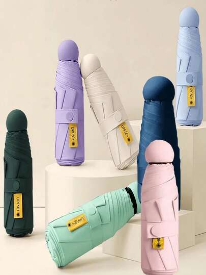 1把便携式迷你折叠口袋伞，超轻胶囊设计，防紫外线防水，晴天雨天适用，时尚纯色，男女通用，是学校、办公室、居家、旅行、户外活动的理想之选，四季必备。