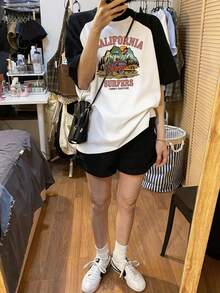 女款落肩袖純棉短袖T恤，夏季中長版寬鬆卡通設計感上衣 - 黑拼白 - 查看 6