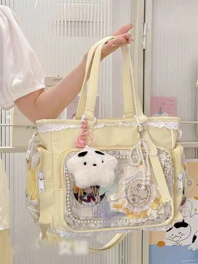 一款日系可爱洛丽塔单肩包，饰有珍珠蝴蝶结和蕾丝花边，尽显优雅少女气质；透明装饰，适合动漫角色扮演；配有可拆卸可调节肩带；大容量休闲手提包，适合学生；可爱时尚的女士手提包；采用防水尼龙材质。