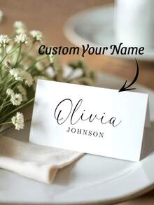 1张定制婚礼姓名卡 - 可编辑桌号卡 | 现代简约设计，黑白配色，心形图案内含姓名首字母 | 适用于婚礼、活动、派对的个性化座位卡 | 9*10厘米，铜版纸 | 可选1张或10张套装 | 完美适用于招待会、新娘送礼会、九月婚礼季派对 | 送给新娘、新郎、婚礼策划师和宾客的理想礼物 | 精致优雅的座位卡，牛皮纸材质，婚礼季派对用品 - 客製化文字 - 查看 10