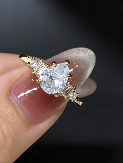 Bague pour femme en argent sterling 925 avec design en forme de larme et zirconias cubiques étincelants. Bijou de fiançailles/mariage