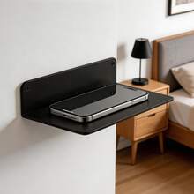 1个小型金属壁挂架，悬浮式转角置物架，带线缆夹，可壁挂安装，用于放置智能音箱、摄像头、显示器、路由器等设备——多功能节省空间的金属壁挂解决方案，适用于现代客厅、卧室、家庭办公室和厨房角落；时尚、防锈的金属结构，配备安全线缆夹，可有序展示设备、流媒体音箱、摄像头和路由器；非常适合紧凑型公寓、单身公寓和时尚床头柜，提供整洁的置物空间、易于安装、隐蔽的线缆管理，并在时尚前卫、充满设计感的家居环境中提升装饰美感。 - 黑色 - 查看 4