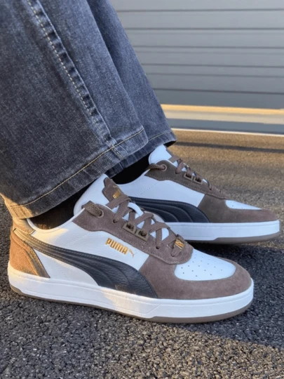  Zapatillas deportivas casuales cómodas de corte bajo con bloques de color blanco y marrón, modelo Caven 2.0 Lux SD de PUMA, unisex