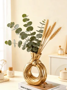 O sticlă decorativă din rășină aurie, în formă de arbore al vântului, perfectă pentru decorarea mesei moderne de acasă, cu un stil boem nordic minimalist, ideală pentru expunerea florilor de pampas și împodobită cu un model unic de fundă. - C - Vizualizare 3