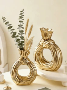 O sticlă decorativă din rășină aurie, în formă de arbore al vântului, perfectă pentru decorarea mesei moderne de acasă, cu un stil boem nordic minimalist, ideală pentru expunerea florilor de pampas și împodobită cu un model unic de fundă. - C - Vizualizare 4