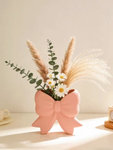 1 chiếc bình hoa lớn bằng nhựa hình nơ, dùng trang trí sân vườn và kệ phòng ngủ, màu hồng/trắng. - Bình hoa hình nơ - Xem 10