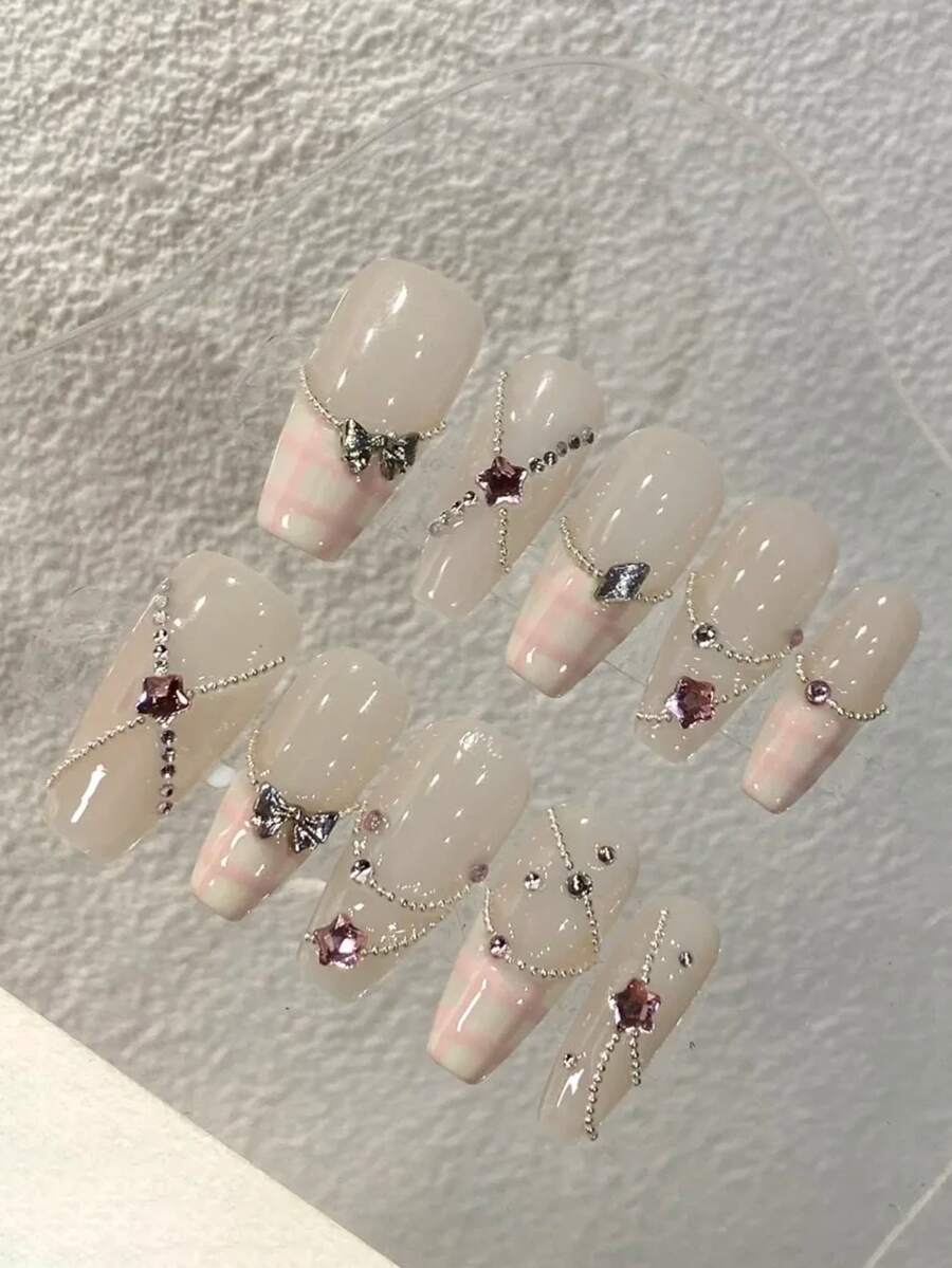 10片纯手工制作的按压式美甲，长棺材形，婴儿粉、白色和金色，带有立体蝴蝶结、星星和格子图案，法式时尚可爱，Y2K风格，柔和闪光，适合女性和女孩，春夏秋冬，节日和日常生活使用。 - 粉色 - 查看 1