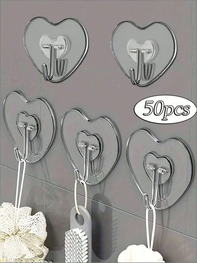 50 piezas Ganchos transparentes y resistentes para pared - Estilo casual, fácil instalación sin taladrar, ganchos prácticos con forma de corazón de plástico, adecuados para cocina y baño, organizador de almacenamiento montado en la pared