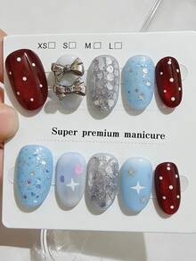 10片纯手工制作的中长椭圆形美甲，蓝红银三色猫眼图案，搭配立体蝴蝶结和圆点，时尚可爱，Y2K风格，柔和闪光，适合女性和女孩，春夏秋冬皆宜，节日及日常佩戴。 - 彩色 - 查看 2