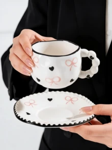 Bộ 1 tách và đĩa sứ nặn tay hình nơ và trái tim, kiểu Pháp dễ thương với họa tiết chấm bi nơ và trái tim, thích hợp dùng trong tiệc trà chiều và tráng miệng, quà tặng chất lượng cao, phù hợp cho nhà hàng, phòng khách, quán cà phê, làm quà tặng hoặc tiệc tùng. - Nhiều màu - Xem 5