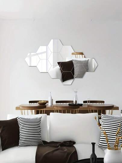 一套16片银色六边形塑料镜面装饰墙贴，适用于卧室、厨房、客厅和浴室。尺寸：7*8厘米/2.75*3.15英寸