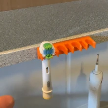 1 pieza Soporte de almacenamiento para cabezales de cepillo de dientes eléctrico ahorra espacio, adecuado para la parte superior del gabinete, soporte de cepillo de dientes adhesivo con 2/4/6 ranuras, caja de almacenamiento de plástico, diseño antigoteo para encimera de baño, ducha, caravana, clip antideslizante para almacenamiento en el hogar, mantiene los cabezales de los cepillos de dientes limpios y organizados, fácil de instalar y quitar - Multicolor - Ver 3