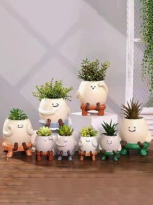 笑脸多肉植物盆栽：一款独特的笑脸造型多肉植物盆栽，底部没有排水孔。这款趣味十足、别具一格的多肉植物盆栽适合室内外装饰。 - 彩色 - 查看 5