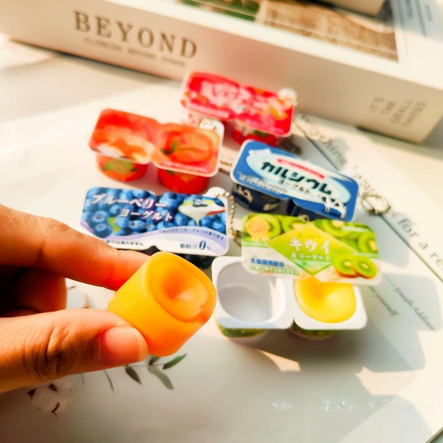 1 chiếc bánh sữa chua mềm mại, đàn hồi, giống thật, hàng mới về năm 2026, thích hợp cho các bữa tiệc, sinh nhật, lễ Phục sinh, lễ tốt nghiệp, làm quà tặng, tiệc hè. - Nhiều màu - Xem 1