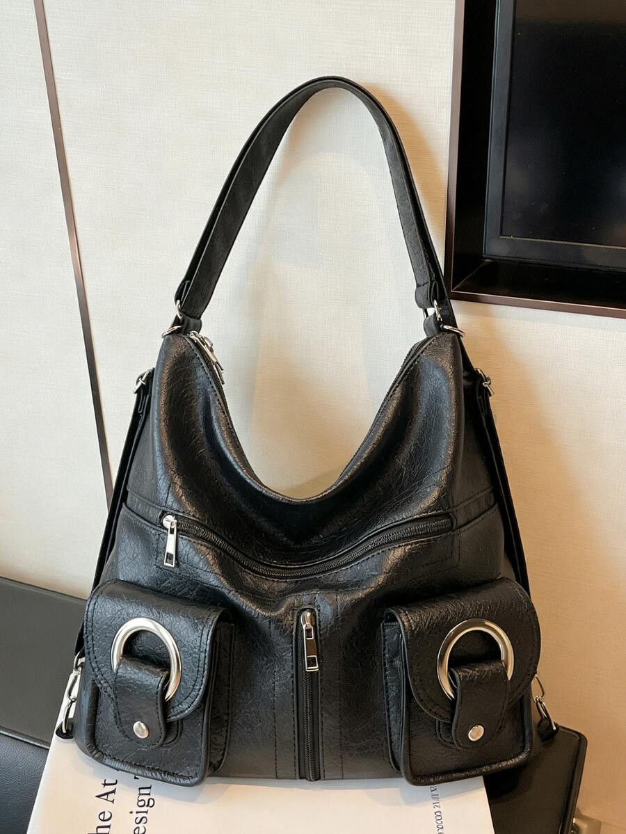 这款时尚简约的大容量女士通勤单肩包采用PU材质，配有镂空铆钉拉链，并附带双肩带和手提带。它适合旅行、通勤和学生使用，既可作为旅行背包，也可作为休闲背包。 - 黑色 - 查看 1