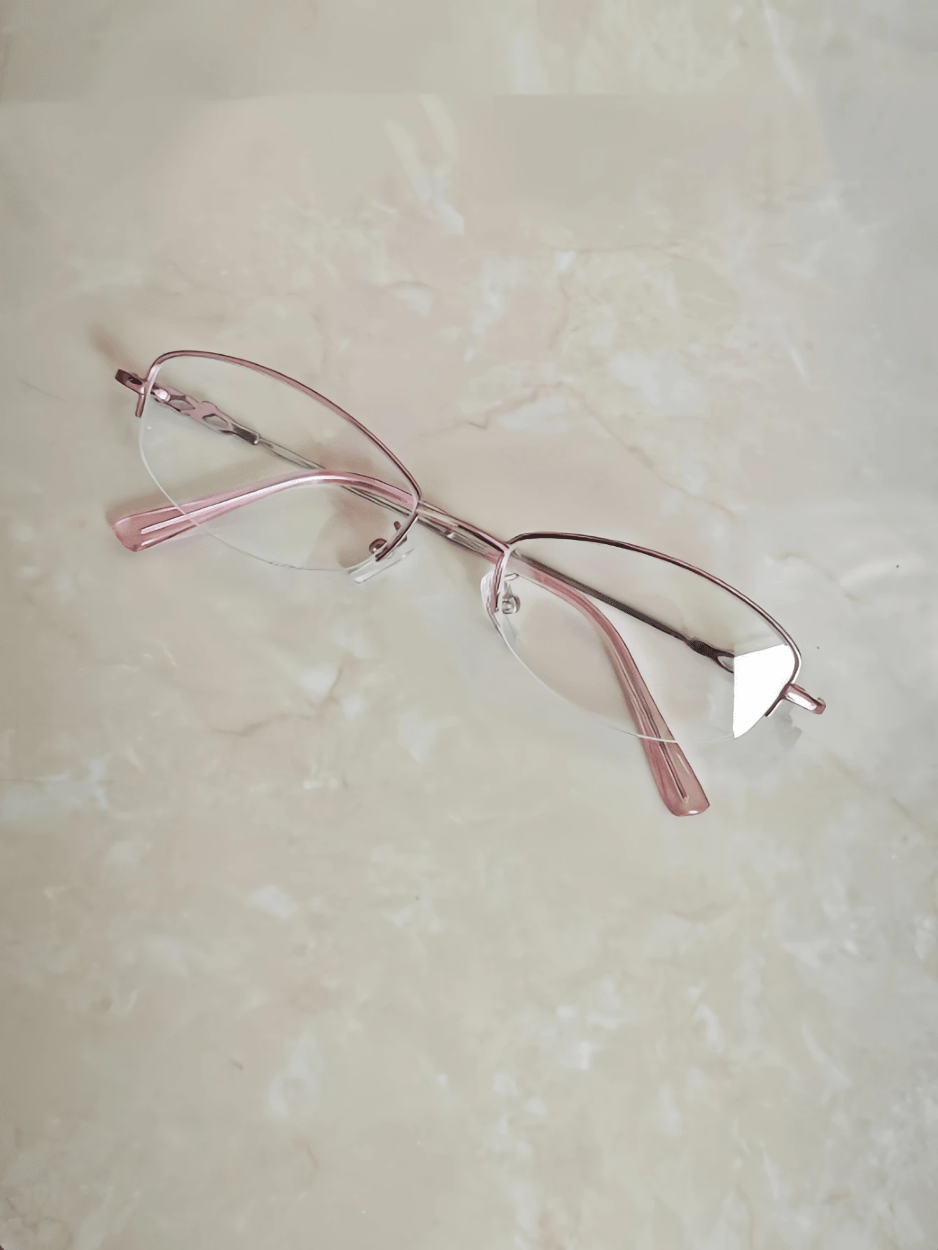 A Pair Of Unisex Metal Semi-Rimless Glasses Featuring A Stylish, Unique, And Artistic Design With Clear Lenses. - Leopard - View 1