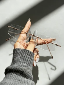 1副超轻无框无度数眼镜，时尚高清树脂超强韧镜片，平面镜片，适合通勤、办公、娱乐和日常佩戴，可作手机配件和礼品。 - 銀色眼鏡架無框 - 查看 6