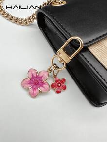 1个樱花造型钥匙扣，轻巧优雅的樱花设计，适合挂在包包上，也可作汽车钥匙链，情侣礼物，生日礼物，节日礼物。 - 玫紅色 - 查看 5